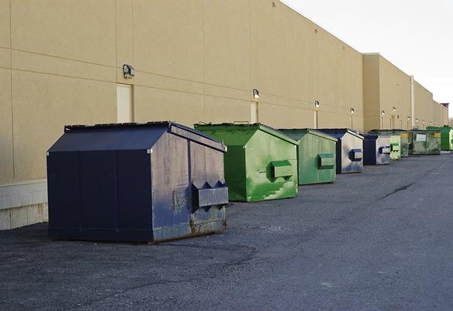 a row of large construction dumpsters on-site in Bernardsville, NJ